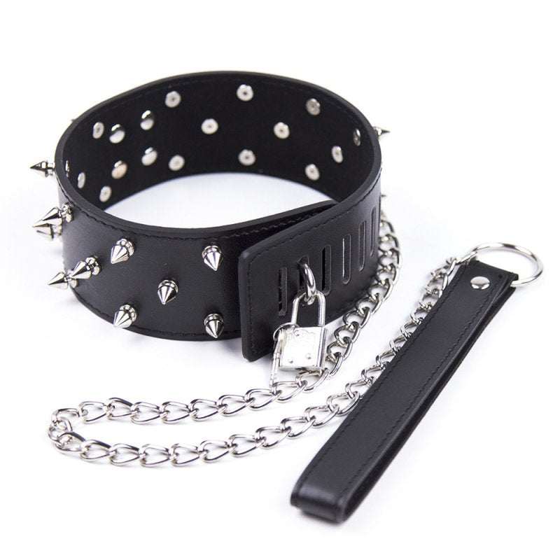 Black PVC collar with metal spikes and attached metal chain leash
