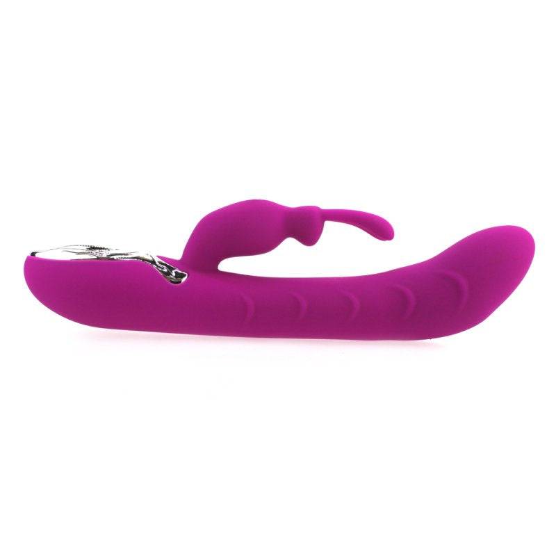 Opvarmende lilla silikone G-punkts rabbit vibrator med ergonomisk design og blød overflade.
