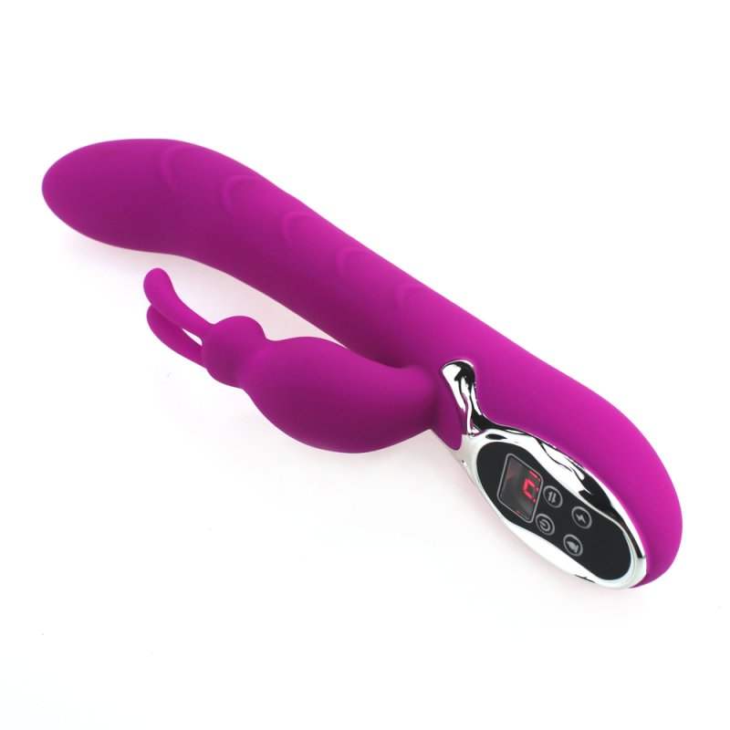 Opvarmende silikon G-punkt rabbit vibrator med ergonomisk design og elegant lilla farve.