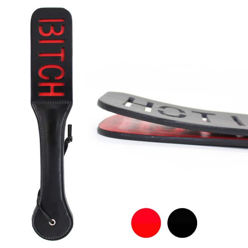 Impression Double Layer Paddle i sort PVC med rødt BITCH-tryk, 32 cm lang og 5 cm bred, let og holdbar.