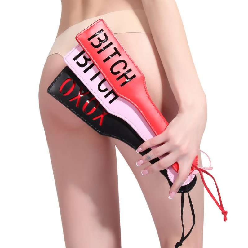 Spanking Fun BITCH Paddle i hvidt PVC, let og fleksibel til sjov og leg
