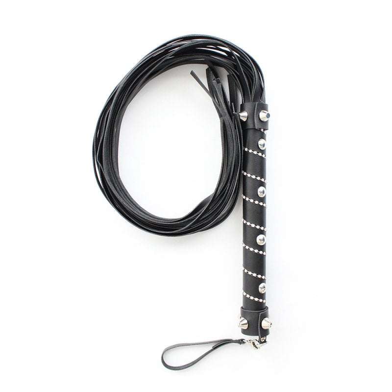 Black diamond handle bondage whip with multiple leather tails and studded gemstone decoration